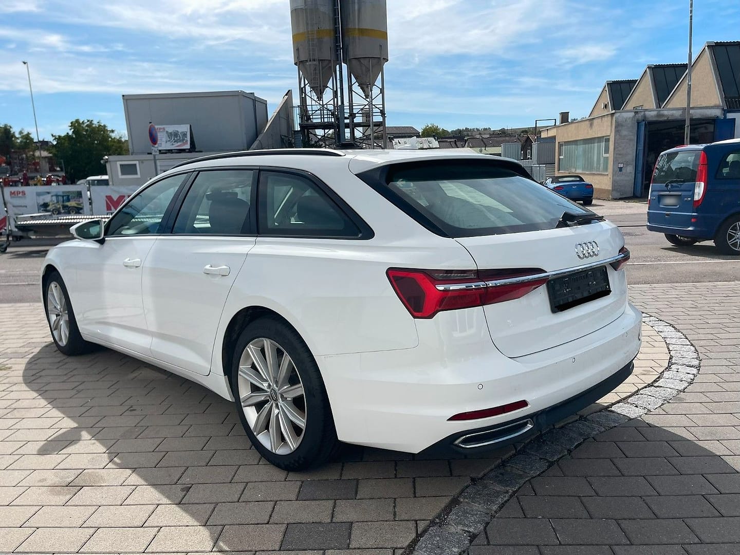 Audi A6 Avant 45 TDI quattro sport, schräg von hinten